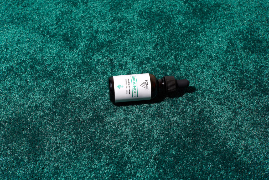 Grounded TONIC cbd tincture at Tricolla Farms hemp farm