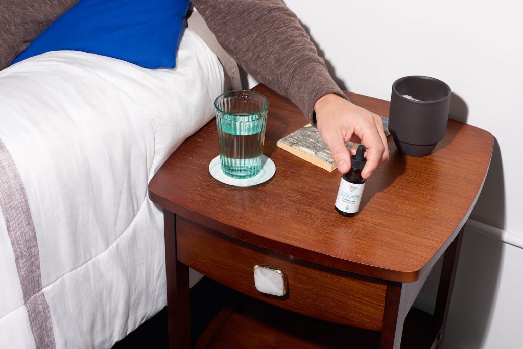 Man reaching for CBD from TONIC